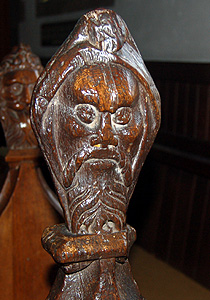 An original bench end in the chancel May 2012